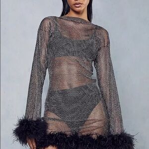 See through fishnet diamanté dress with feather trim